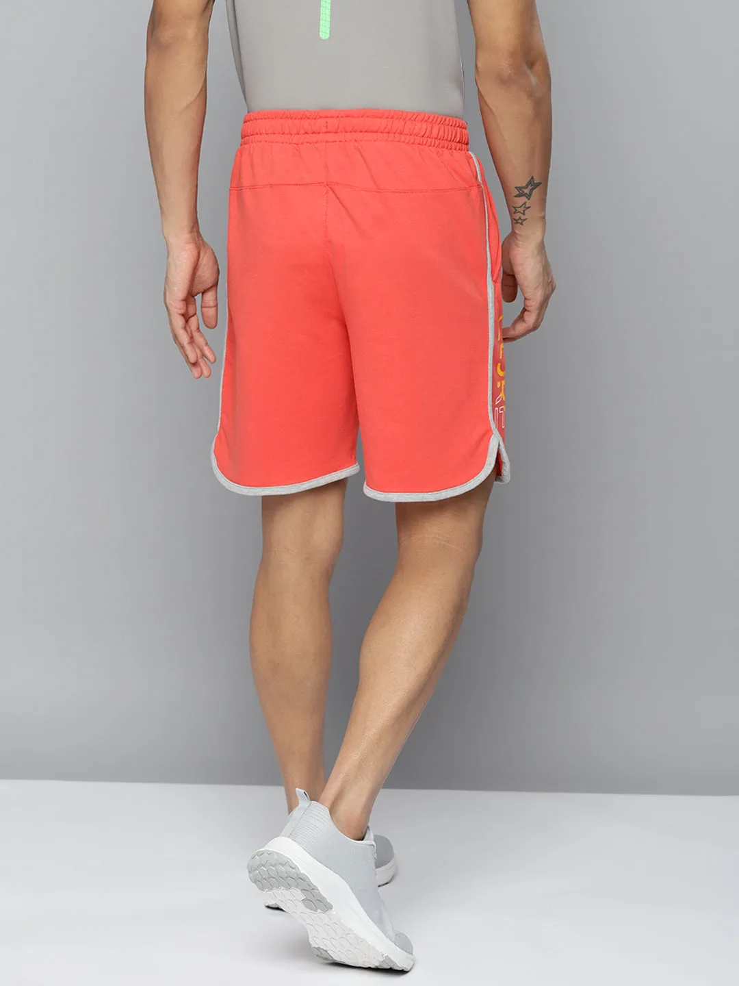 Alcis Men Peach-Coloured Typography Printed Running Shorts