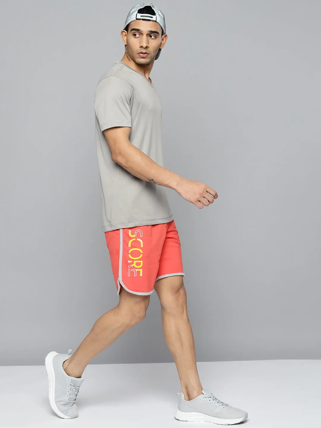 Alcis Men Peach-Coloured Typography Printed Running Shorts